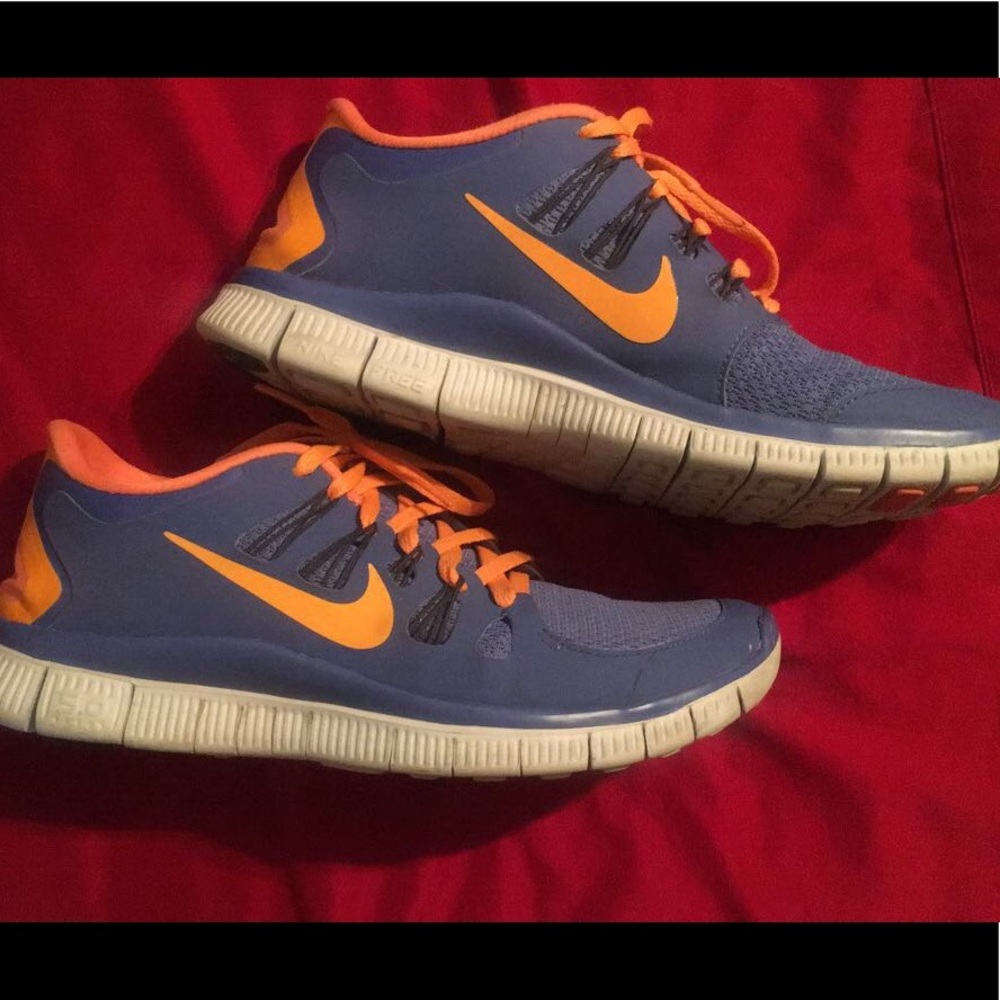 Orange and blue Nike shoes